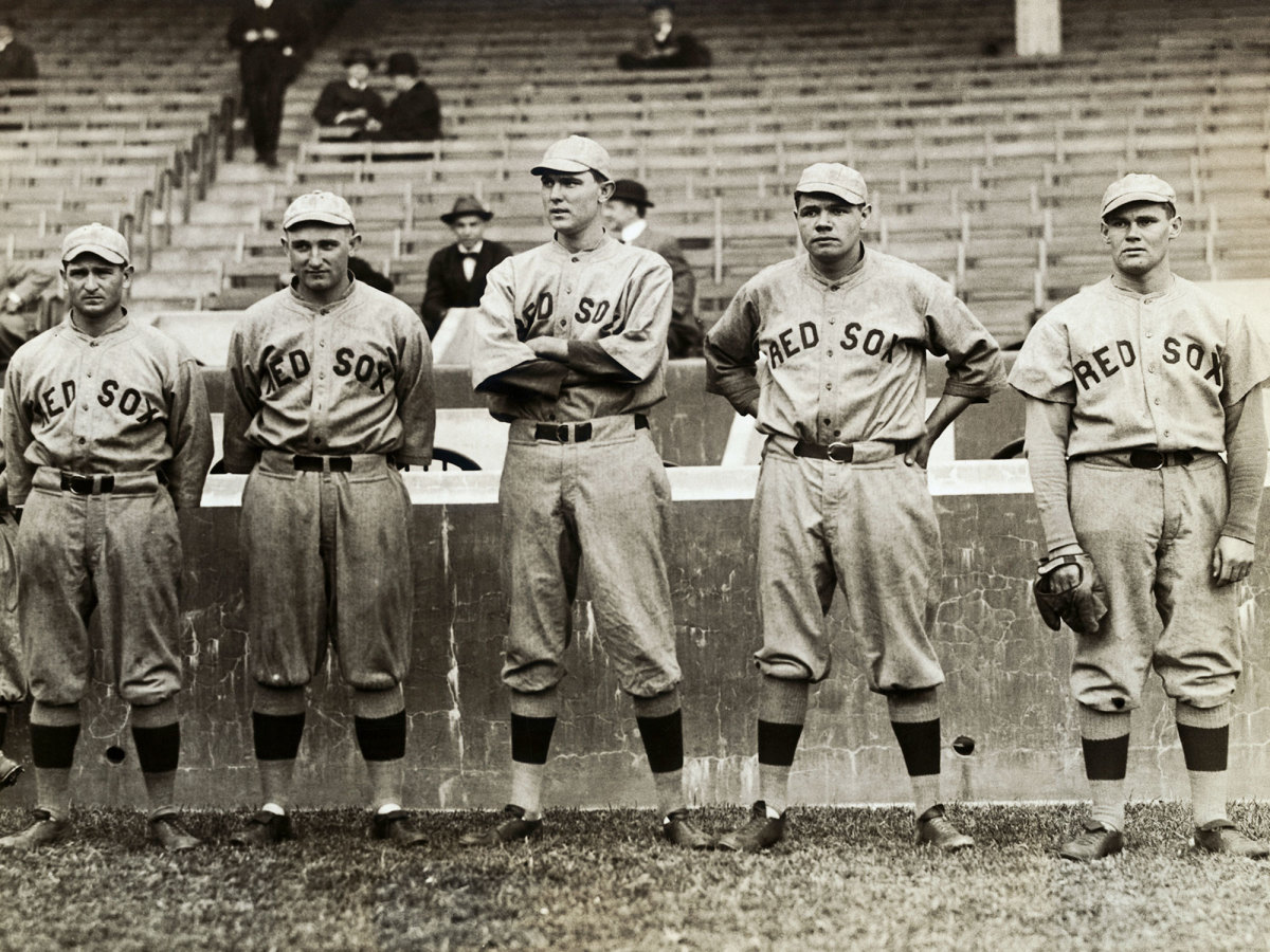 Members of the Red Sox, including Babe Ruth (second from right), stand together.